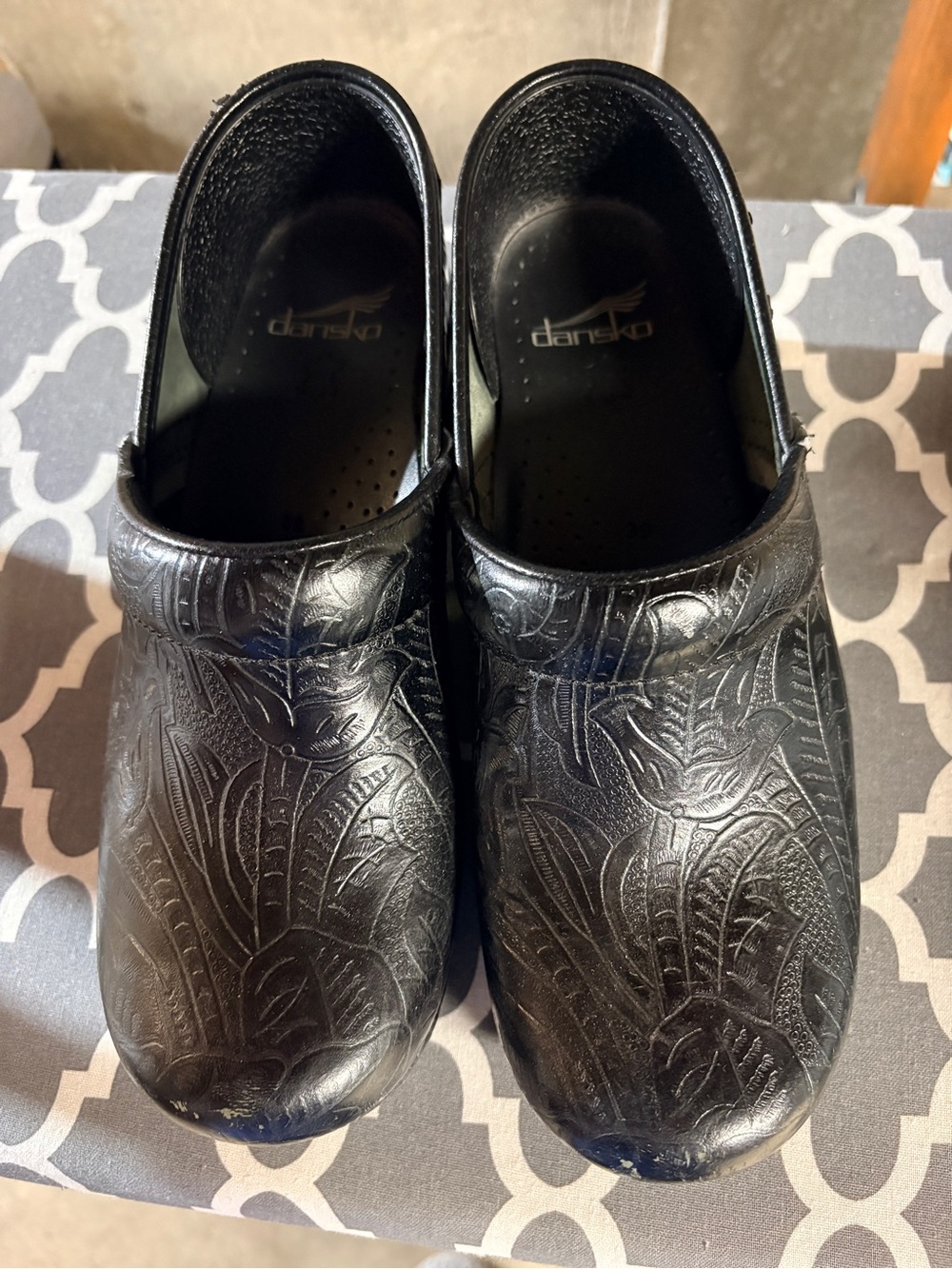 “Dansko” Women’s Black Embossed Slip-On Clog